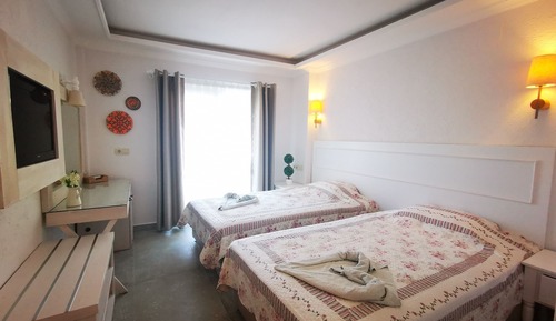 Habitación estándar con 1 cama doble o 2 individuales