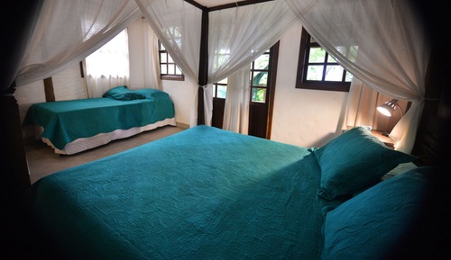 Habitación triple Premium, patio, en la zona del jardín