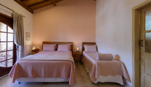 Habitación triple Premier, patio, en la zona del jardín