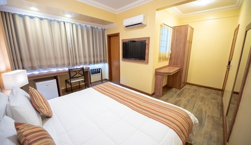 Habitación de lujo con 1 cama doble o 2 individuales
