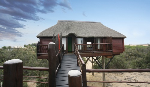 Bungalow, vistas parciales al mar