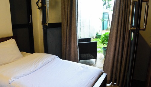 Habitación Deluxe doble, 1 cama doble, vistas al jardín, en la zona del jardín