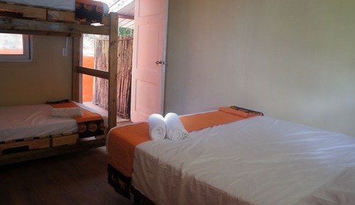 Habitación cuádruple estándar, varias camas, terraza, vistas al jardín