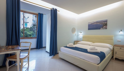 Habitación cuádruple Deluxe