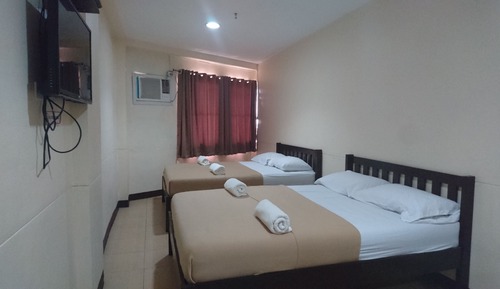 Habitación cuádruple Deluxe