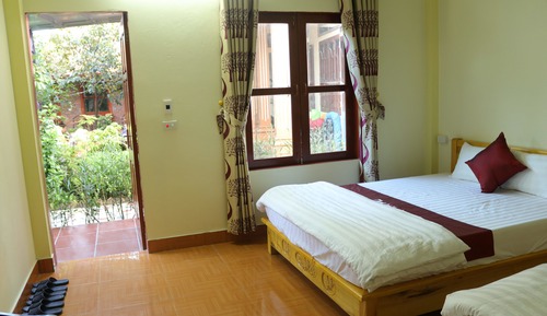 Habitación cuádruple Deluxe, 1 habitación, vistas al jardín, en la zona del patio