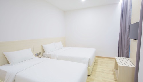 Habitación triple Deluxe