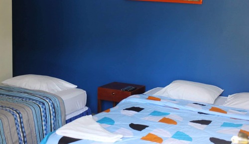Habitación triple básica, varias camas