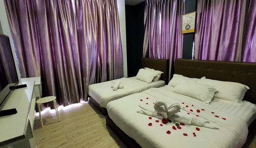 Habitación triple Deluxe