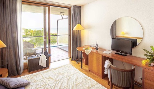 Habitación doble de uso individual, vistas parciales al mar