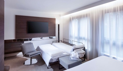 Suite superior, varias camas