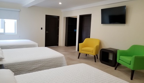 Habitación triple de lujo, varias camas, 2 baños, en esquina