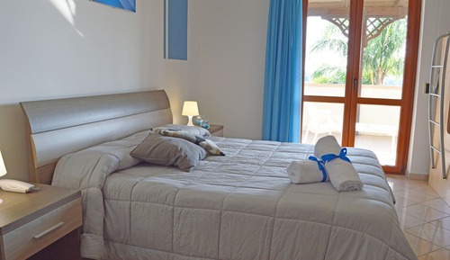 Habitación cuádruple superior, varias camas