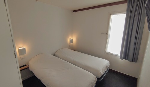 Habitación con 2 camas individuales