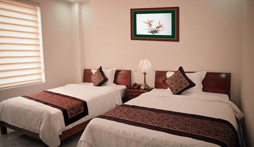 Habitación superior con 2 camas individuales, vistas al mar