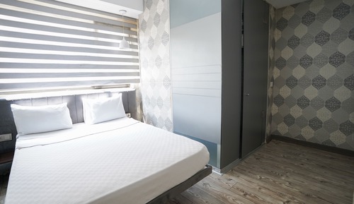 Habitación estándar con 1 cama doble o 2 individuales