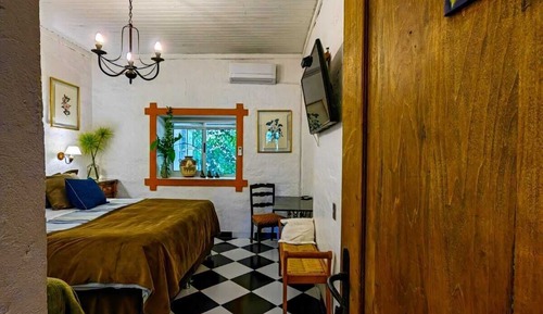 Habitación familiar, varias camas, vistas al jardín