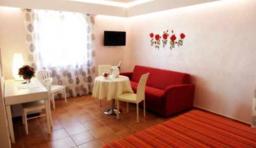 Habitación cuádruple Deluxe, vistas al jardín