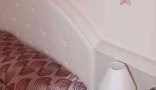 Habitación cuádruple Deluxe, 1 cama de matrimonio con sofá cama, vistas parciales al mar
