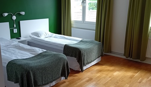 Habitación superior con 2 camas individuales