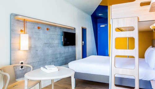 Habitación triple, varias camas