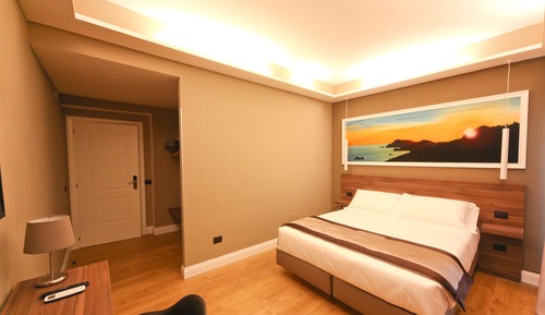 Habitación Deluxe con 1 cama doble o 2 individuales, balcón