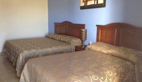 Habitación familiar, varias camas