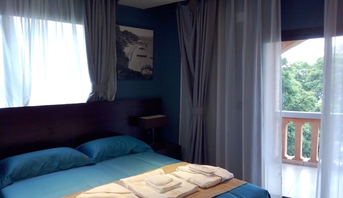 Habitación Confort con 1 cama doble o 2 individuales