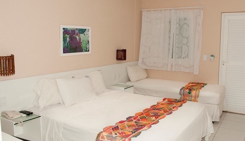 Habitación superior, vistas parciales al mar