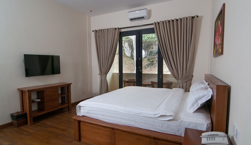 Habitación Deluxe, 1 cama de matrimonio grande, vistas al jardín