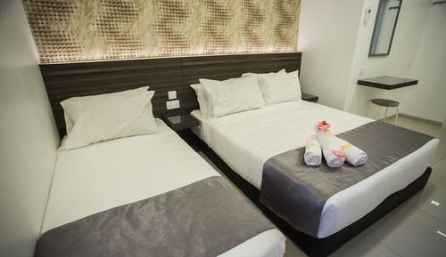 Habitación triple Deluxe, 2 habitaciones