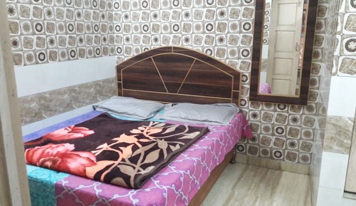 Habitación triple Deluxe, varias camas