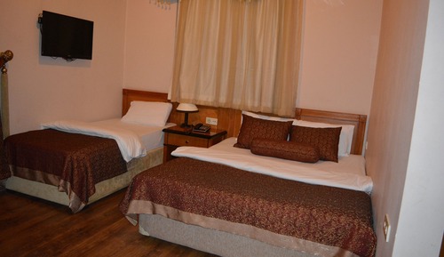 Habitación triple Signature