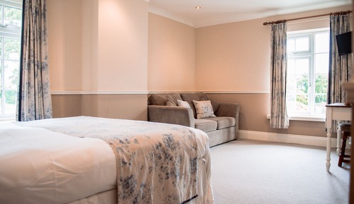 Suite Deluxe, baño privado (with Sofa Bed)