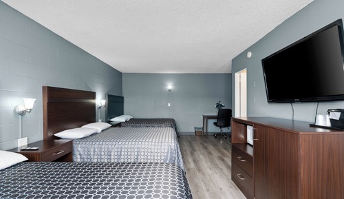 Habitación triple (3 Queen Beds)
