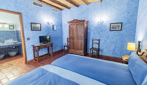 Habitación superior con 1 cama doble o 2 individuales
