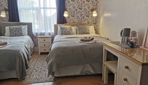 Habitación triple básica, varias camas