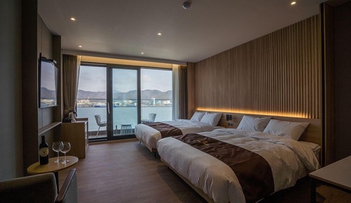 Habitación familiar con 2 camas individuales, vistas al mar