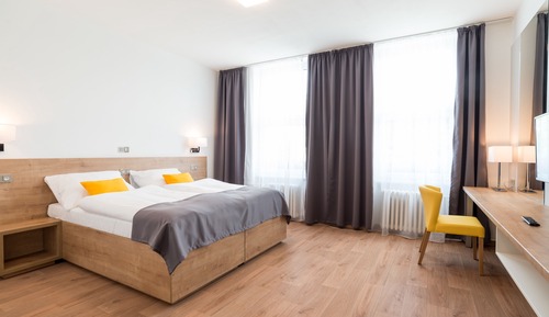 Habitación superior con 1 cama doble o 2 individuales