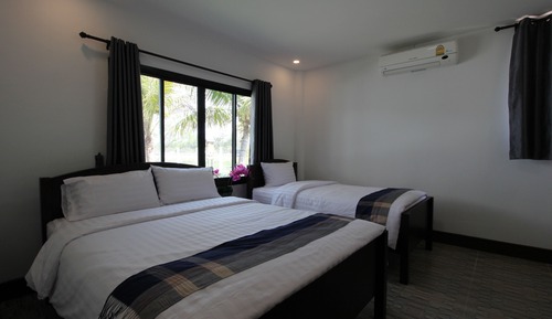 Habitación triple familiar, 1 habitación, vistas al jardín, en la zona del jardín