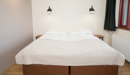 Habitación Confort con 1 cama doble o 2 individuales, patio