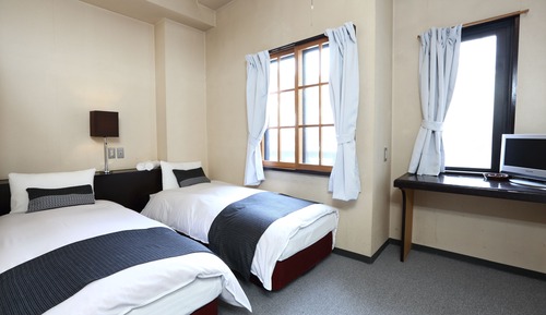 Habitación estándar con 1 cama doble o 2 individuales