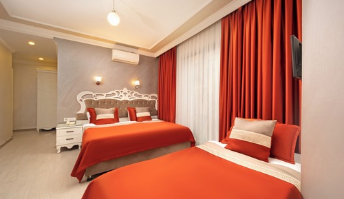 Habitación triple Deluxe