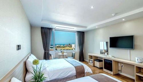 Habitación familiar con 2 camas individuales