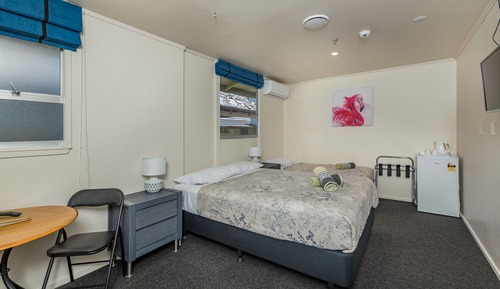 Habitación triple, varias camas