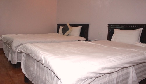 Habitación superior con 1 cama doble o 2 individuales