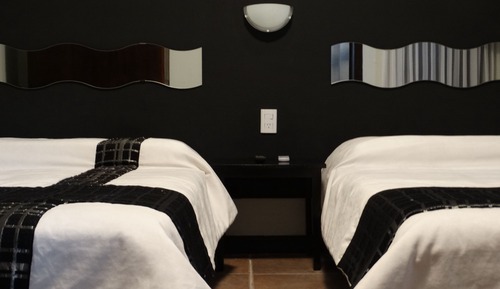Habitación cuádruple Deluxe, 2 camas de matrimonio