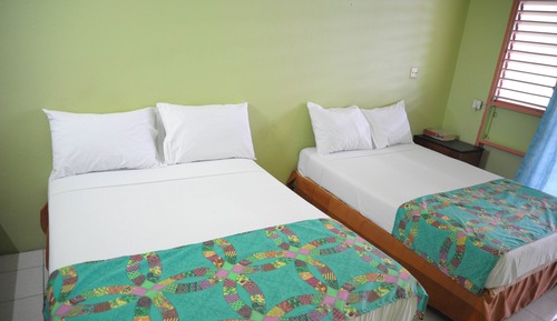 Standard with a Queen bed or 2 double beds, with Fan