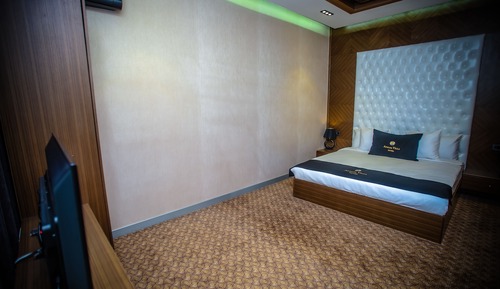 Suite Deluxe, 1 cama de matrimonio grande, fumadores, vistas al jardín