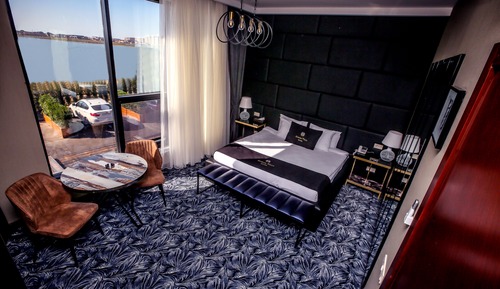 Habitación estándar, 1 cama de matrimonio grande, fumadores, vistas al lago